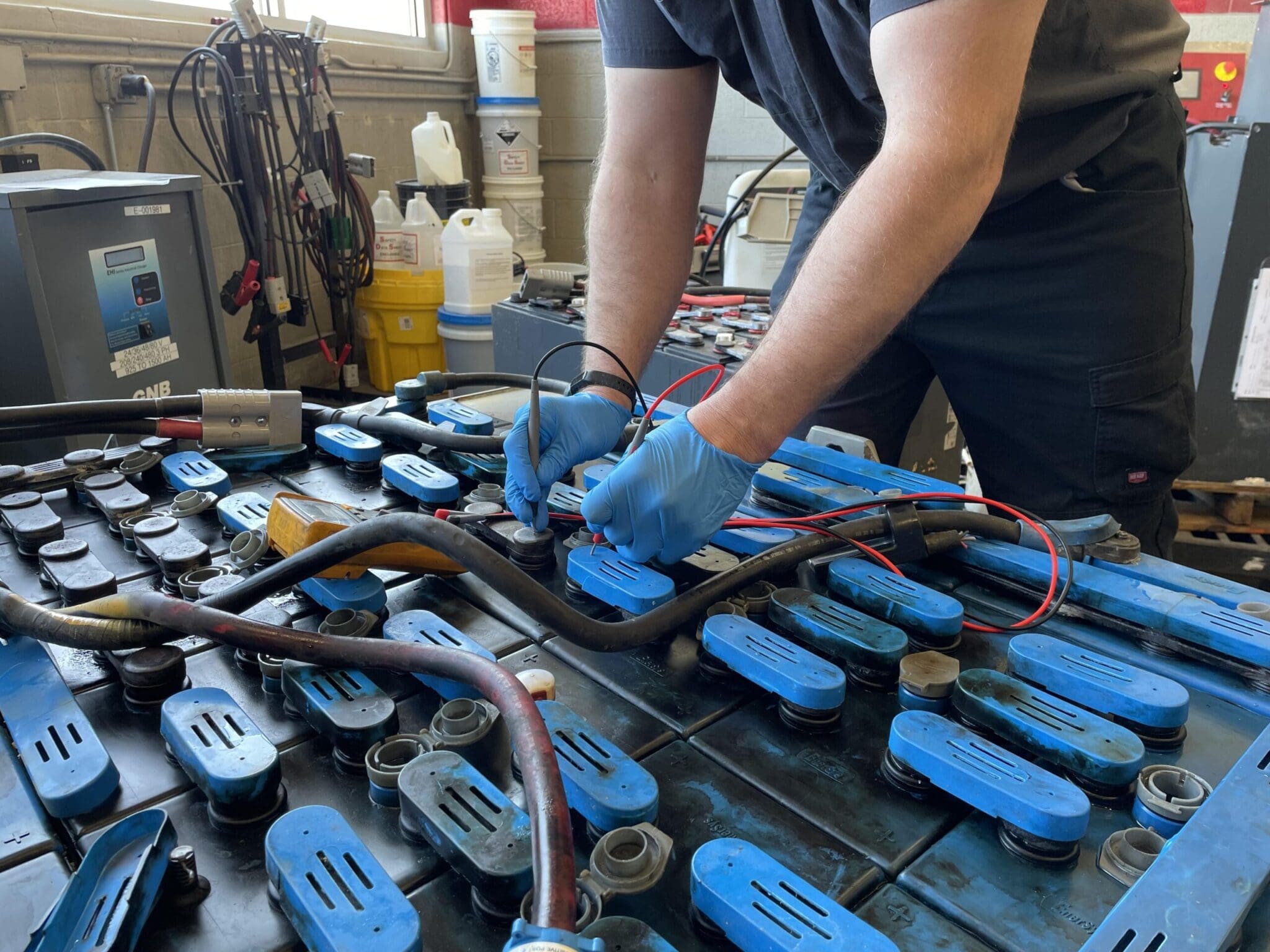 Warehouse Forklift Battery Cleaning services in Dallas - Specialized cleaning services for forklift battery stations and charging areas in warehouses and distribution centers. We neutralize acid spills, clean battery residue, and maintain safe, compliant charging station environments.